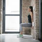 Wall squats are a convenient home workout exercise. Photo: Getty Images