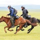 North Canterbury brothers, Ben (left) and Hugh Dampier-Crossley, gallop across the Mongolian...