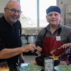 Invercargill chef and restaurateur Graham Hawkes tries the pasta created by St Peter's College...