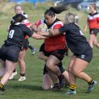 Canterbury forward Juliette Talanoa charges at the Otago defence during the South Island women’s...