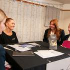 LaTouch owner Juliet Kavanagh chats with Cromwell College Year 12 pupils (from left) Olivia...