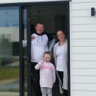 Maguire family members Fleur, Bradon and Myah (5) celebrate the completion of their new Exmouth...
