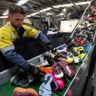 Shoes are recycled at Fast Feet Grinded, the world's first shoe recycling factory processing...