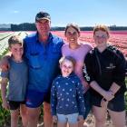 Blair and Jody Drysdale, from Balfour, with their children Fletcher, Leah and Carly in a field of...