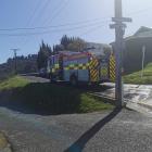 A firetruck leaves the scene of a scrub fire in Ravensbourne around 3pm this afternoon. Photo:...