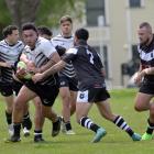 Scorpions centre Crete Whaanga crashes the ball up during a one-off fixture against the New...