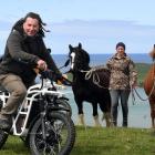 Neil and Cara Meyer, of Catlins Horse Riding, introduce their new Ubco eco-tourism e-motorbikes...