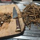 Chop the roots into pieces about the size of peas. PHOTO: HILARY ROWLEY