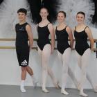 Standing in front of the barre at the Pointe Central ballet studio are (from left) Hunter...