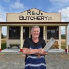 Milton abattoir owner Rex Spence gets ready to share his new replica 1930s butchers shop,...