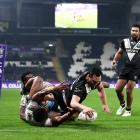 Wing Jordan Rapana kicked four pressure goals and diving over for a try on the hooter to seal the...