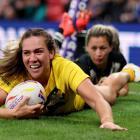Australia's Evania Pelite goes over to score their 10th try against New Zealand at Old Trafford...
