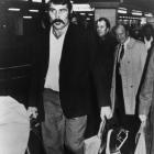 Keith Murdoch, wearing a blazer sans Silver Fern, arrives at Euston Station in London. Photo from...