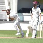 Otago Volts bowler Michael Rippon sends one down as Northern Districts batsman Scott Kuggeleijn...