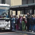 Cruise ship passengers and Dunedin residents wait to board the 3.31pm bus to Port Chalmers...