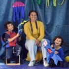 Photographer Edith Amituanai works with Van Casey (7) and Arlo Paira (7) at Port Chalmers School...