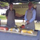 Raggedy Range's Nick Loughnan at his Wanaka market stall with Canadian assistant Jill Wiersma....