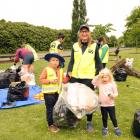 Organiser Antonia Wood and her children William (6) and Sophie Macknight (3) take part in a Logan...