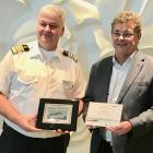 Celebrity Eclipse Captain Zisis Taramas (left) and Port Otago general manager marine Captain Sean...