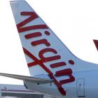 Virgin, which did not declare a final dividend, noted there had been a "continuation of softer...