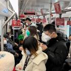 Commuters ride a subway train during the morning rush hour in Shanghai. Photo: Reuters