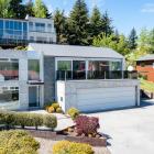 A two-bedroom “industrial chic” home on Tenby St, in Wanaka, attracted 39 bids. Photo: Supplied