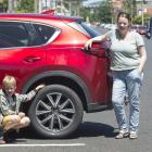 Amber Marshall with son Zac Garraway, and her car which failed a warrant of fitness test because...