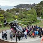 Emergency personal and members of the community gather during the official opening of a rescue...
