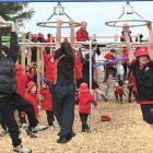 Brockville Full Primary School pupils test the new playground during the opening day yesterday....
