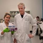 Senior lab technician Elita Piseth looks at samples with technical manager Robert Van Hale at...