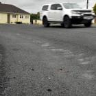 Recent roadwork in Clermiston Ave, Dunedin, has left blemishes down the street, leading residents...