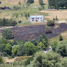 Six fire trucks and a helicopter worked to put out the blaze off Hansen Rd. Photo: Otago Fire and...