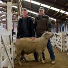 Jeff Young (left), of Kanuka Hill farm, paid the top price for ram 66/21, at the Gore A&amp;P...