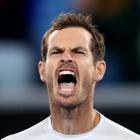 Andy Murray celebrates after winning his second round match against Australia's Thanasi...