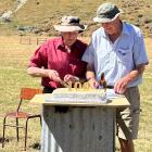 The St Bathans Collie Club’s oldest life member, Jim Morgan, of Omakau, cuts the birthday cake at...