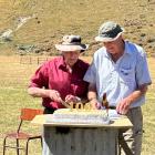 The St Bathans Collie Club’s oldest life member, Jim Morgan, of Omakau, cuts the birthday cake at...