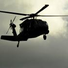 A Black Hawk helicopter in stealth mode with its rotors switched off to reduce carbon emissions....