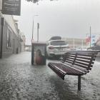 Heavy rain in Mackay St in central Greymouth. Photos: Greymouth Star