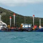 Dredges work on the Te Rauone Beach upgrade last year. PHOTO: PORT TO PORT CRUISES AND WILDLIFE...