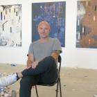 Marc Blake works on his latest paintings in his studio space at Broker, his gallery in Queenstown...