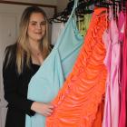 Shanae Barton shows some of her collection of dresses available to rent. PHOTO: SIMON HENDERSON