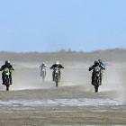 The field in the NZ Beach Racing Champs up to 500cc class kick up sand during this year’s Indian...