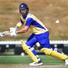 Otago captain Hamish Rutherford plays through the offside during his match-winning innings of 120...