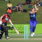 Kate Anderson, of the Canterbury Magicians, backs up as Otago Sparks bowler Sophie Oldershaw lets...