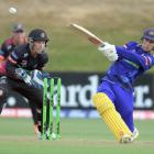 Otago batter Max Chu smashes the ball to the legside boundary during his side’s Super Smash...