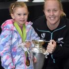 Former Black Fern Kendra Cocksedge poses for a photo with young fan Charlee Hollanby-Padman at...