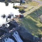 A helicopter at the Arnold Dam site near Greymouth this morning. Photo: Greymouth Star