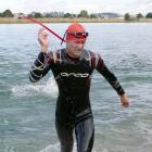 Eventual Ken Milne Classic individual triathlon winner Mark Watt, of Balclutha, emerges from the...