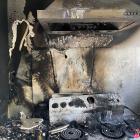 The remnants of a stove where an almost-lethal kitchen fire started from a pot of fat. PHOTOS:...