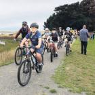 Off they go . . . Henry Lancaster, aged 11 of Rangiora, takes the lead as the cyclists set off on...